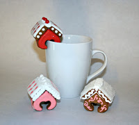miniature mini gingerbread house houses hanging on a mug and decorated