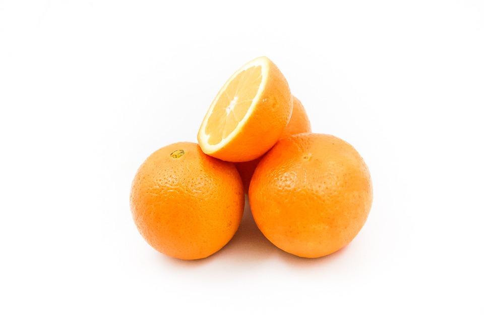 fresh oranges on a white background