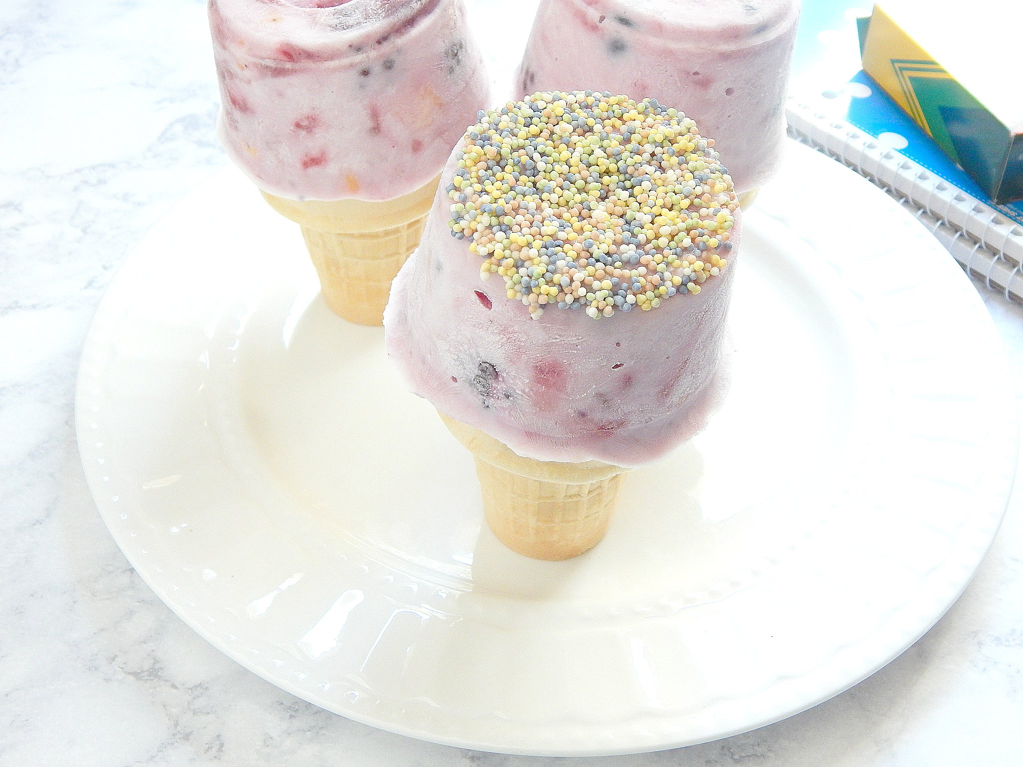 Sprinkles topped frozen yogurt tutti frutti breakfast to go on sugar bananas
