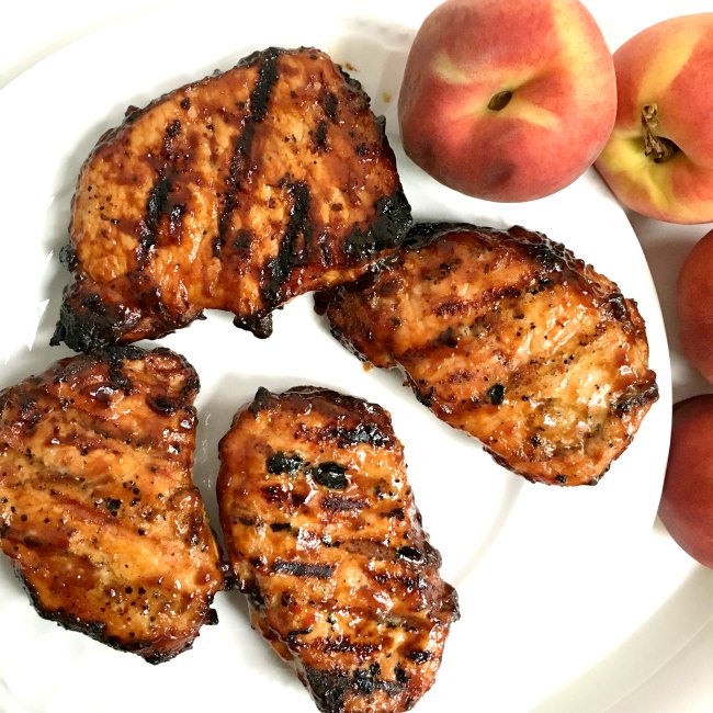 peach bbq sauce grilled onto pork chops on www.sugarbananas.com